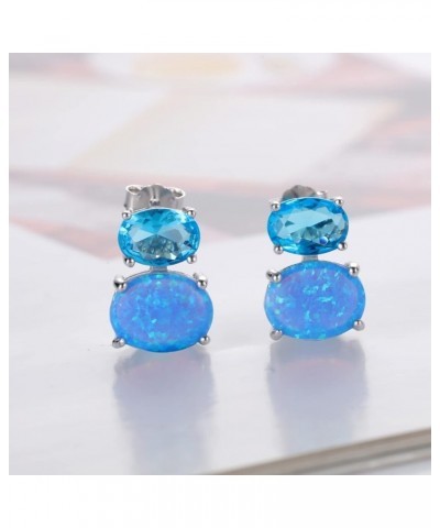 Gold Plated Sterling Silver Fire Opal Prong Setting Birthstone Stud Earrings White Gold Plated sterling silver & Blue Opal $8...