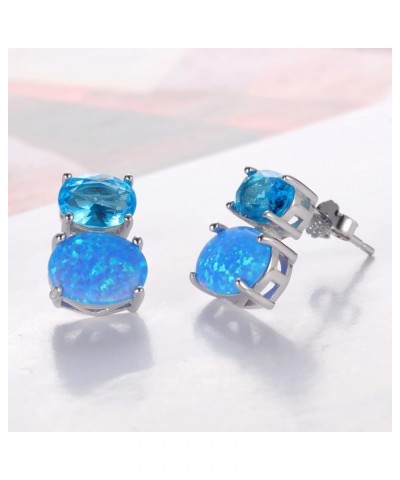 Gold Plated Sterling Silver Fire Opal Prong Setting Birthstone Stud Earrings White Gold Plated sterling silver & Blue Opal $8...